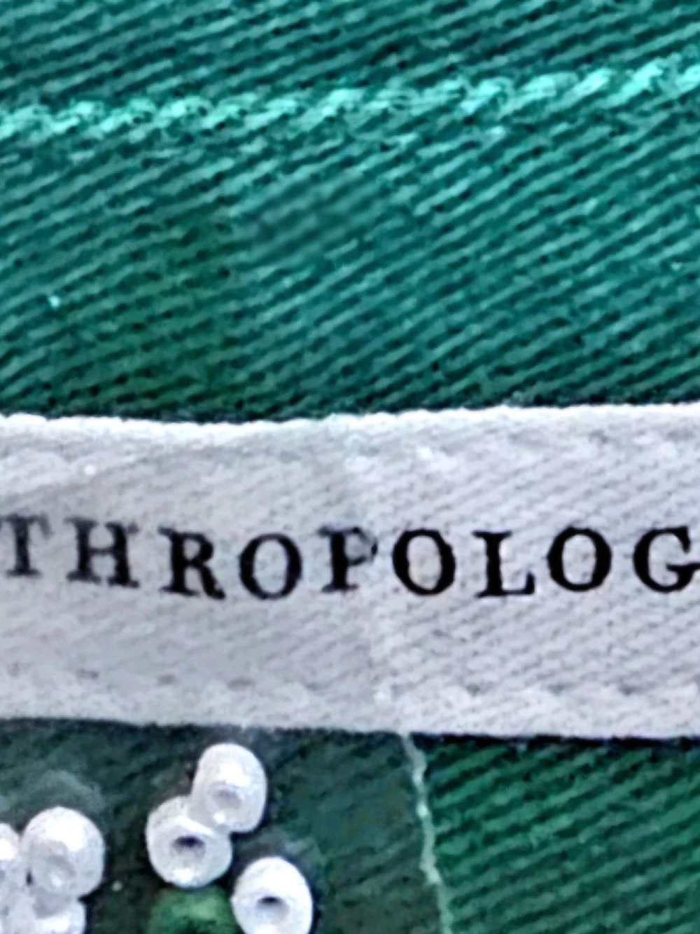 Anthropologie Green and White Beaded Half-Moon Clutch with Tassel